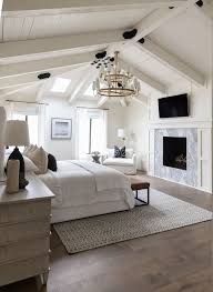 vaulted ceilings accentuate the neutral