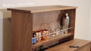 If you are sharing your finished diy project, please explain how it was done. Building A Secret Bar With A Hidden Tv Cabinet Lift Youtube