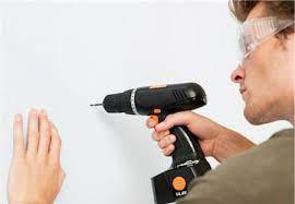 Before Drilling Holes In Your Walls