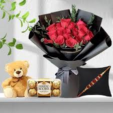 bouquet of red roses teddy and