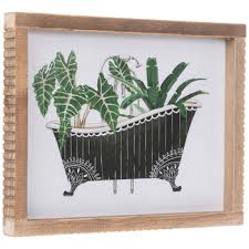 plants in bathtub framed wall decor