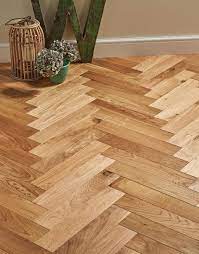 Herringbone is such a popular flooring design because it offers clean lines and simplicity. Trade Select Natural Oiled Herringbone Parquet Oak Solid Wood Flooring Direct Wood Flooring