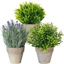 small artificial plants in pots