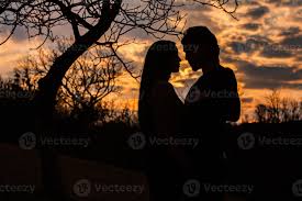 silhouette of romantic couple in love