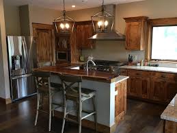 knotty alder kitchen cabinets and black