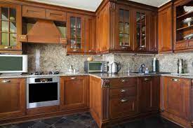 While it is possible to learn how to repair water damaged mdf or plywood kitchen cabinets, especially if the repairs are minor, it's always smart to hire a professional. How To Remove An Odor From Wooden Cabinets In A Kitchen