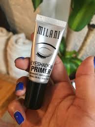 a milani eyeshadow primer that actually stays put on oily lids and just helps keep your eye makeup entirely intact no matter how many unconscious attempts