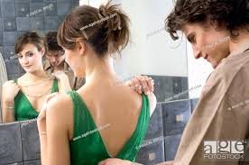 young couple in bathroom stock photo
