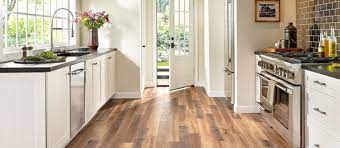 And it's highlighted by wood laminate flooring that mimics hardwood designs quite well, don't you think? Laminate Flooring In The Kitchen Pros Cons Options And Ideas 2021 Home Flooring Pros