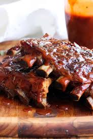 these slow cooker country style pork ribs are cooked with a fabulous homemade sauce garlic onions