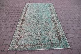 sparta handmade mint green area rug