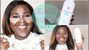 her makeup with baby powder