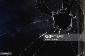 bullet hole in glass 