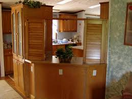 In this idea guide, we will discuss several ideas on how to separate the kitchen from the living room such as using room dividers, screens, and wall partitions. Modern Divider Design For Kitchen And Living Room