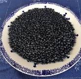 Where did black beans and rice originated?