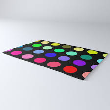 rainbow polkadot on black rug by