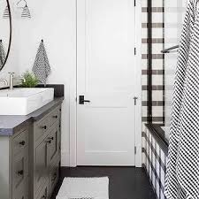 black herringbone bathroom tiles black