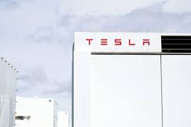 musk tesla launch new battery plant