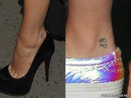 The tattoo is placed beneath her existing inkings on her wrist, is a map of the world. Lily Allen S Tattoos Meanings Steal Her Style