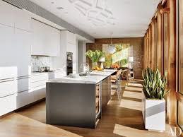 Contemporary kitchen cabinets are generally composed of minimal ornamentation and flat surfaces. 35 Sleek Inspiring Contemporary Kitchen Design Ideas Architectural Digest