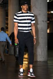 In the 2016 playoffs, russell westbrook has worn everything from flowing, billowy pants to a shirt with a giant hole in the front — his shirts, pants, hats and shoes designed by many different people. Russell Westbrook S Wildest Weirdest And Most Stylish Pregame Fits Nba Fashion Streetwear Men Outfits Westbrook Fashion
