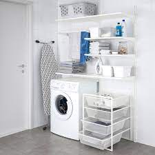 Stacking the washer and dryer can save valuable floor space in a small bathroom or laundry room. Jonaxel Storage Combination White Ikea
