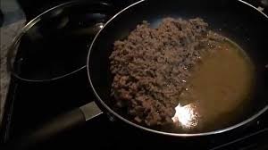 remove grease from cooked ground beef