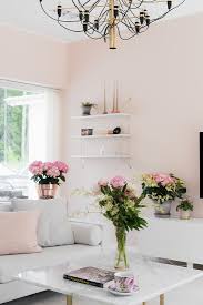 white furniture and fresh flowers in