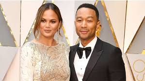 A map legend is a side table or box on a map that shows the meaning of the symbols, shapes, and colors used on the map. John Legend Gets Handsy With Chrissy Teigen As The Couple Enjoys An Italian Getaway Amid Her Bullying Scandal Fox News