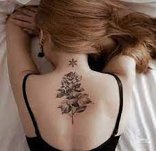 It is a place full back tattoo for female, it has a skull largely drawn on the upper part and the face of a woman down. Top 30 Back Tattoos Incredible Back Tattoo Designs Ideas