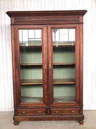 antique cabinet in wood and glass for