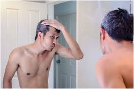causes of pre greying of hair