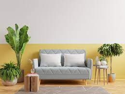 Interior Yellow Wall With Gray Sofa In