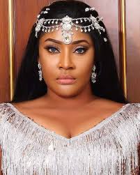 angela okorie throw shades at her fake