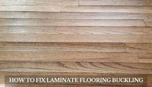 how to fix laminate flooring buckling