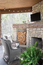 Patio Stone Fireplace With Brick Accent