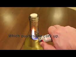 1) using a drill and a nail about the length of the cork, drill the nail into the cork leaving just enough space for you to lodge the back of a hammer around the nail. 6 Methods Of Opening A Wine Bottle Without A Corkscrew