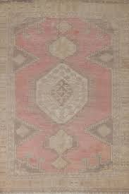 distressed pink bakhtiari persian rug 5x7