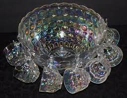 white carnival glass punch bowl and 7