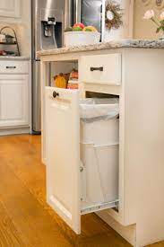 clever ideas to hide your kitchen trash can