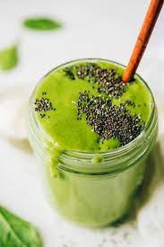green protein smoothie eating bird food