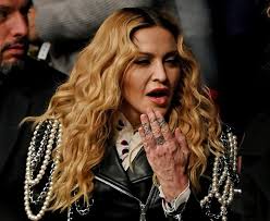 Madonna holds the guinness world records for selling over 300 million albums and hence being the best selling female recording artist of all times.; Madonna Gets Age Shamed For Her Hands