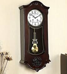 brown wooden pendulum wall clock by