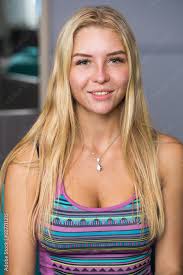 young blonde woman without makeup stock
