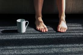 fix a squeaking floor under carpet