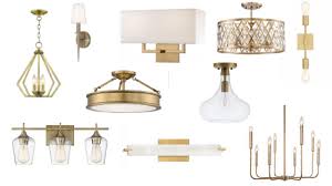 All the champagne bronze hardware in this section from the hinges to the pulls to the hooks match exactly. Champagne Bronze Cabinet Hardware To Match That Beautiful Champagne Bronze Faucet Bronze Kitchen Lighting Bronze Light Fixture Bronze Bathroom Light Fixtures