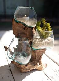 Three Glass Display Bowls On Driftwood