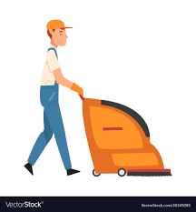 man pushing floor cleaning machine