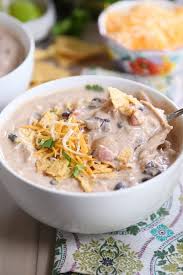 Top your bowl of white chicken chili with crushed tortilla chips for a satisfying crunch. Instant Pot White Chicken Chili Slow Cooker Mel S Kitchen Cafe