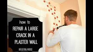 how to repair a large in plaster